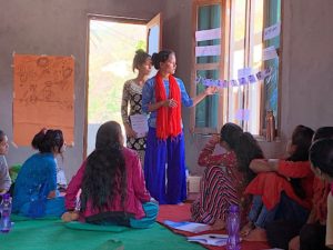 2019 - Tejana in front (Manisha back) in the ToT (Training of Trainers) coordinators teaching the closing ceremony