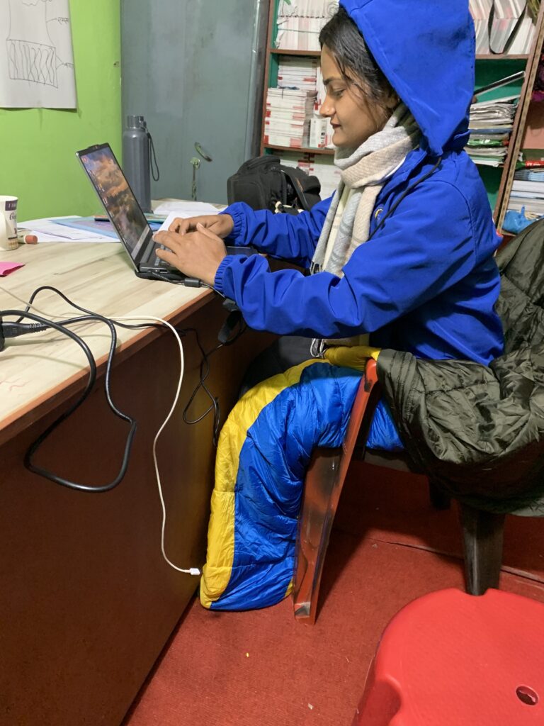 Working on a laptop while wrapped in a sleeping bag